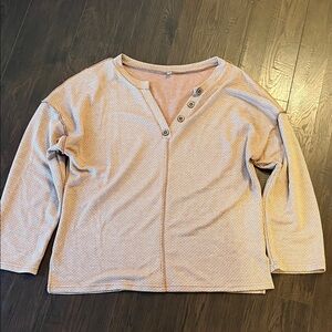 Boutique Size L
Runs large.  Orange & cream colors